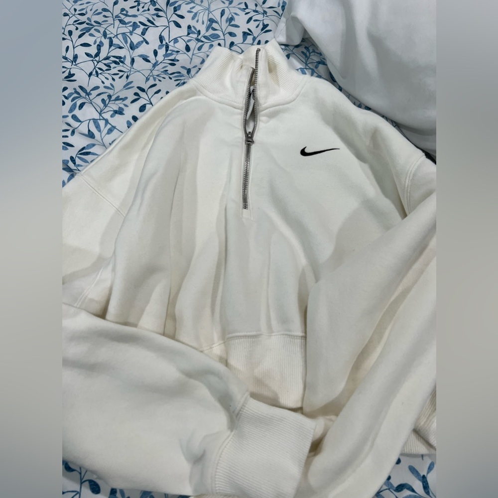 Slightly used Nike white women sweater